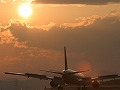 夕日と旅客機 JAL/772